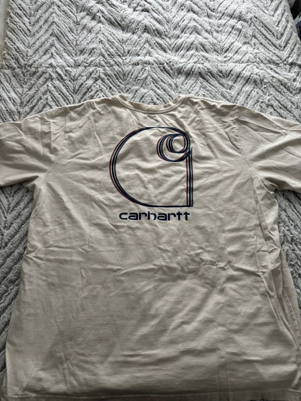 Carhartt Men’s Cream t-shirt with red, green, and blue stripes